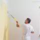 Man painting wall
